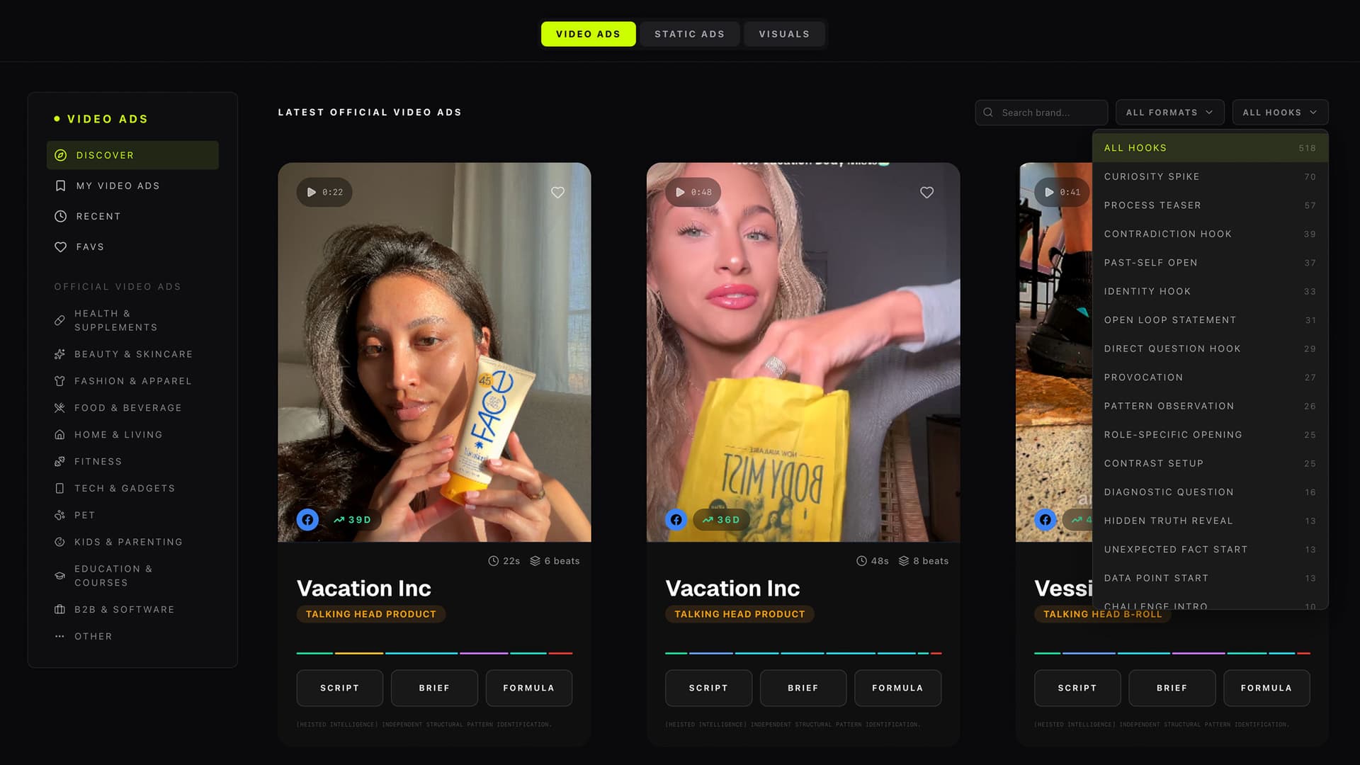 Heista Heist Library video ads discover view showing decoded Vacation Inc and Vessi ads with category sidebar (health, beauty, fashion, food, home, fitness, tech, pet, kids, education, B2B), format and hook filters, and Script / Brief / Formula buttons on each card